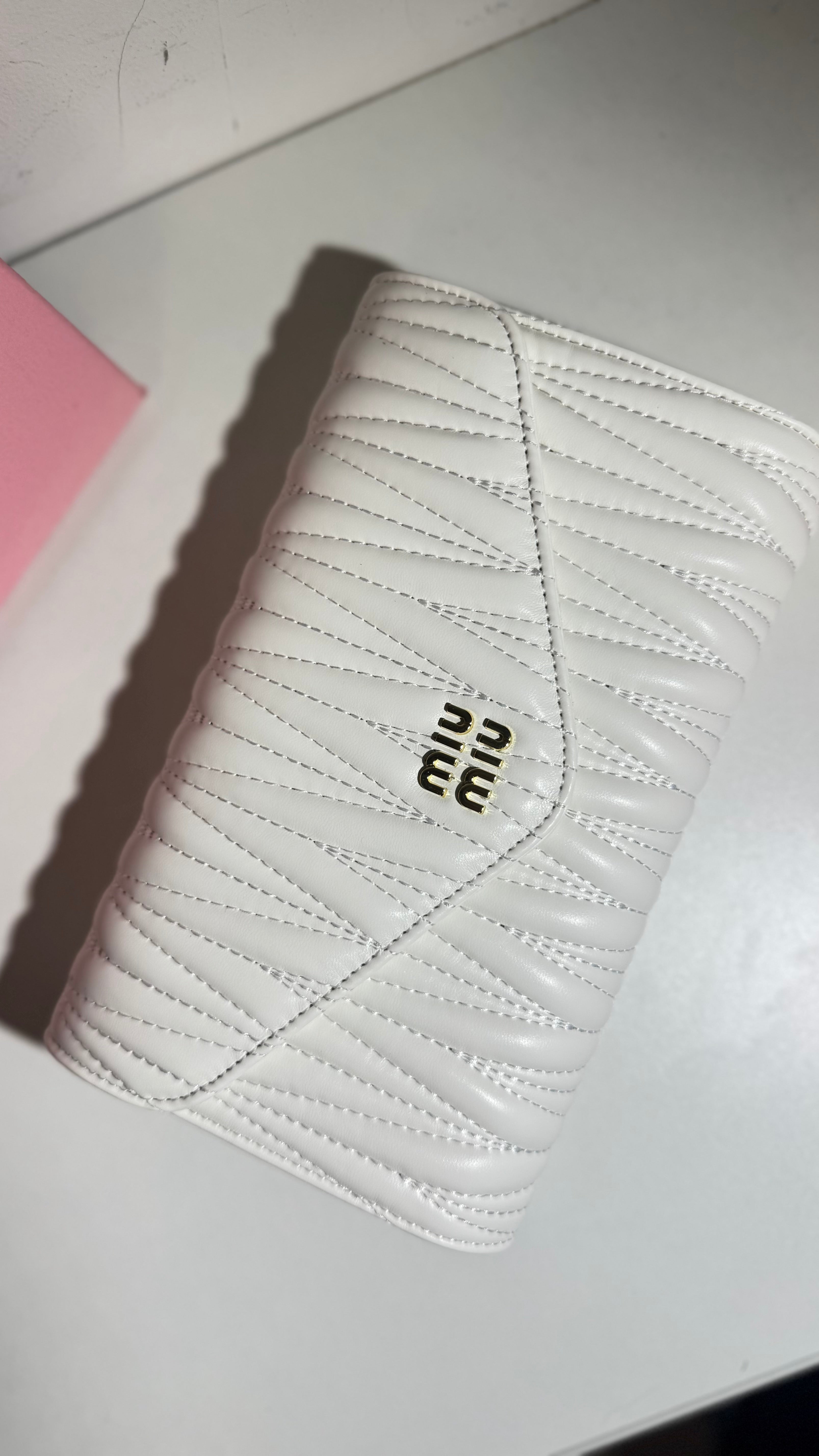 Cross miu miu
