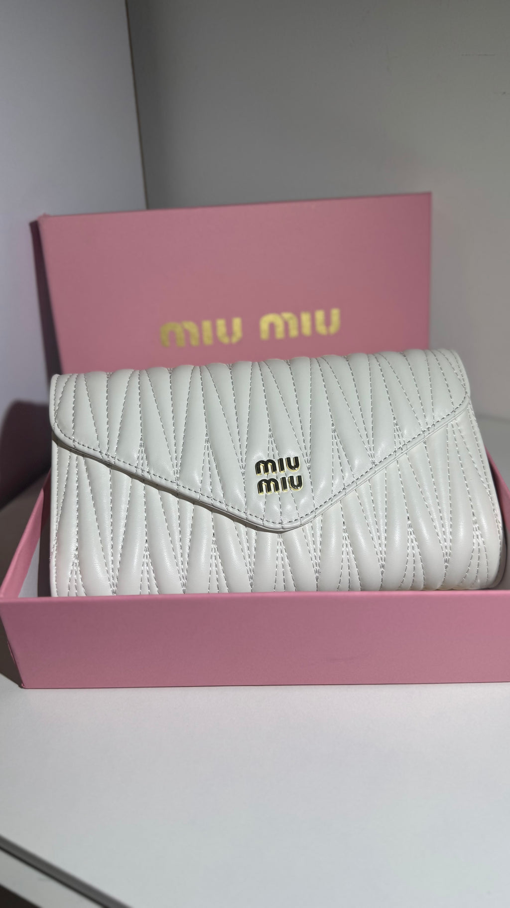 Cross miu miu